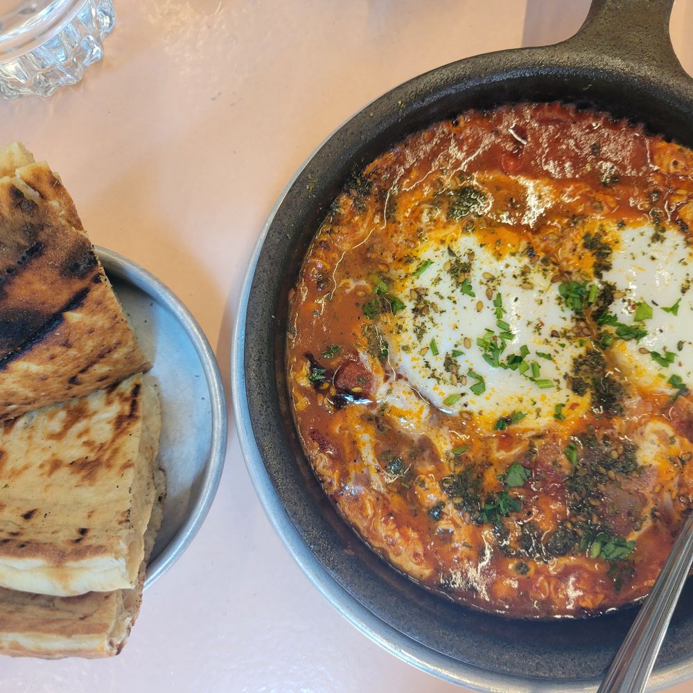 Shakshuka and pita. Shakshuka and pita.