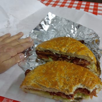 J. Viviano & Sons - A huge BLT served on fantastic bread that is soft on the inside and crunchy on the outside. Very unique bread, i loved it! - Imported Food Near Me - Saint Louis, Missouri J. Viviano & Sons - A huge BLT served on fantastic bread that is soft on the inside and crunchy on the outside. Very unique bread, i loved it! - Imported Food Near Me - Saint Louis, Missouri
