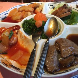 La Chine impériale - La table de riz bœuf avec sauce fade sole panée insipide canard sec bons scampis