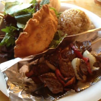 Johnny Pacific - #1: Korean beef skewers with rice and mixed greens and empanada. - Latin American Near Me - Winnetka, California Johnny Pacific - #1: Korean beef skewers with rice and mixed greens and empanada. - Latin American Near Me - Winnetka, California