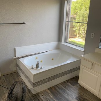 Home Builders Elite - Tile bathroom back splash and around base of tub to match new shower. - General Contractors Near Me - Houston, Texas
