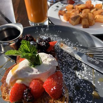 Patria Cocina - French Toast with blueberries strawberry,whipped cream topped with fresh mint - Mexican Near Me - Atlanta, Georgia Patria Cocina - French Toast with blueberries strawberry,whipped cream topped with fresh mint - Mexican Near Me - Atlanta, Georgia
