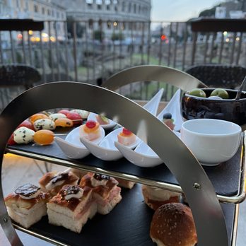 The Court - Truffle + mortadella sliders, smoked salmon slider, olives + caprese - Cocktail Bars Near Me - Rome, RM The Court - Truffle + mortadella sliders, smoked salmon slider, olives + caprese - Cocktail Bars Near Me - Rome, RM