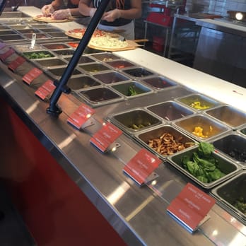 Blaze Pizza - Making pizza with all those toppings. - Salad Near Me - Hicksville, New York Blaze Pizza - Making pizza with all those toppings. - Salad Near Me - Hicksville, New York