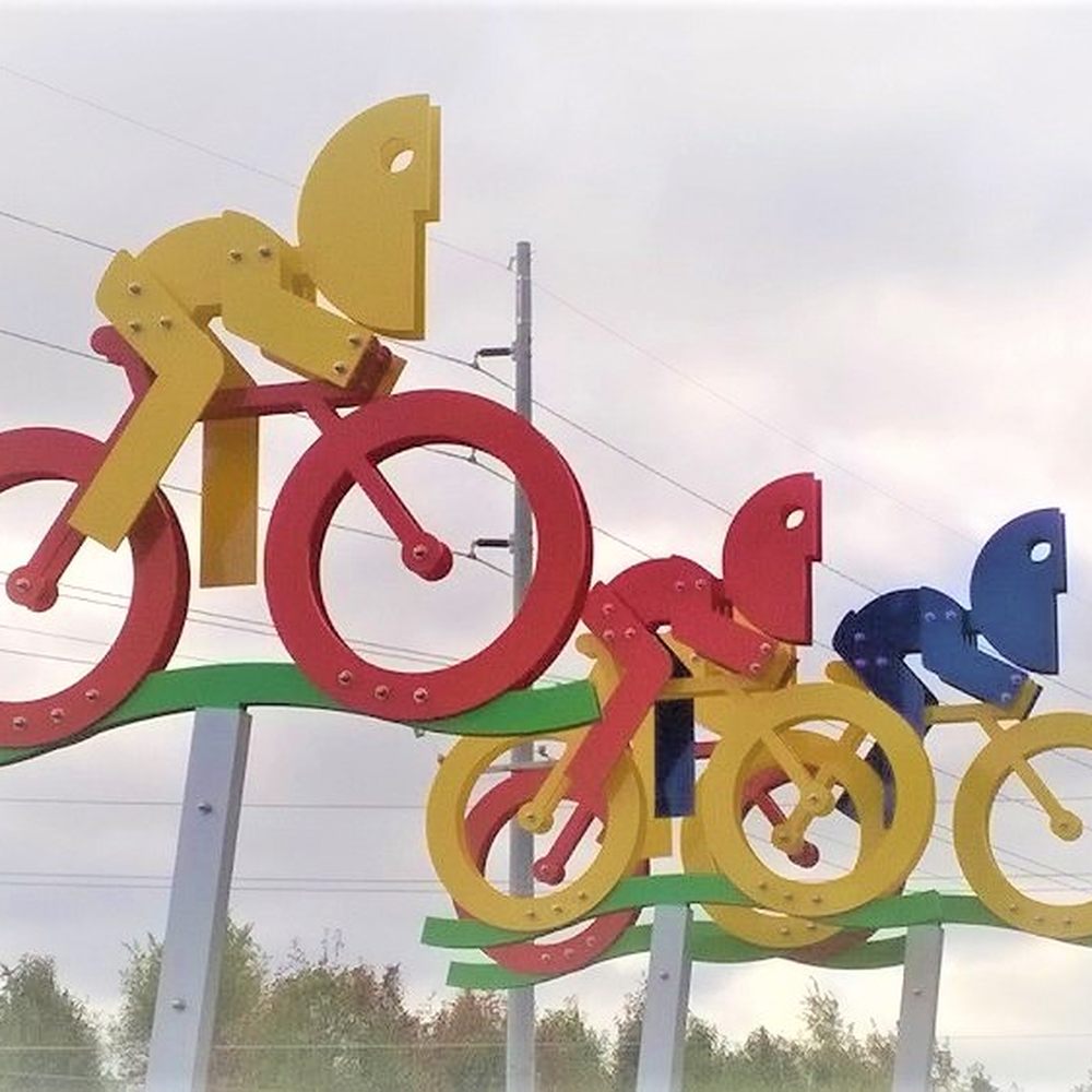 Hazel Dell Parkway Roundabout Sculptures - On Wheels by Jorge Blanco 2017 at 116th St - Public Art Near Me - Carmel, Indiana Hazel Dell Parkway Roundabout Sculptures - On Wheels by Jorge Blanco 2017 at 116th St - Public Art Near Me - Carmel, Indiana