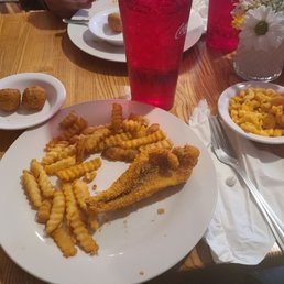 Catfish, fries, mac n cheese and hush puppies Catfish, fries, mac n cheese and hush puppies