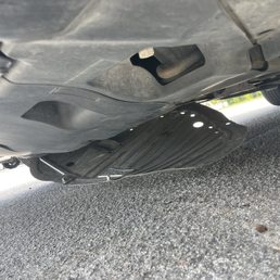 Skid guard post oil change