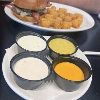 Barrel House - Burger with potato rounds and 4 sauces - Bars Near Me - Frisco, Texas