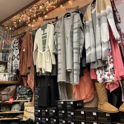Bronze Buckled Beauties Tanning & Gift Shop - Purses  clothing, boots, sandals, wallets & more!