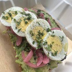 Single Avocado Toast with pickled red onions added. Delicious!