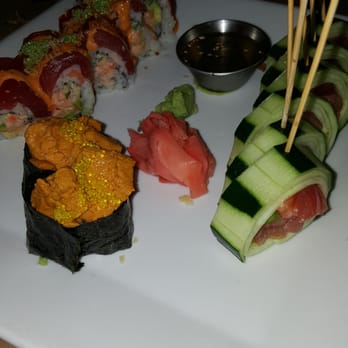Sushi Alive - Left to right: Jade Dragon roll, uni roll, Lollipop roll - Sushi Bars Near Me - Tampa, Florida Sushi Alive - Left to right: Jade Dragon roll, uni roll, Lollipop roll - Sushi Bars Near Me - Tampa, Florida