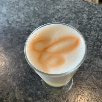 Cache Cocktail & Wine Bar - A tasty whiskey sour with a cute Bitters design sprayed on. - Wine Bars Near Me - St. Clair Shores, Michigan Cache Cocktail & Wine Bar - A tasty whiskey sour with a cute Bitters design sprayed on. - Wine Bars Near Me - St. Clair Shores, Michigan