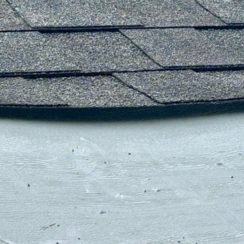 Cook Aluminum - Loose Shingles by the porch panel - Garage Door Services Near Me