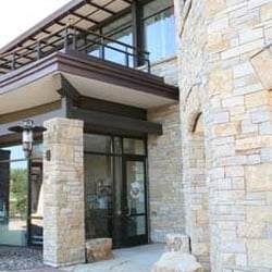 Kneaded Relief Day Spa & Wellness - Kneaded Relief's Entrance. We are located on the back of a beautiful building with a Prairie view.