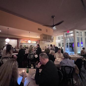 Gina's on Congress - a crowded restaurant - French Near Me - Austin, Texas