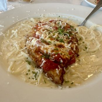 Emma Elle's Italian Kitchen - Chicken Parm with side spaghetti subbed With Alfredo instead of the traditional red sauce. - Italian Near Me - Yukon, Oklahoma Emma Elle's Italian Kitchen - Chicken Parm with side spaghetti subbed With Alfredo instead of the traditional red sauce. - Italian Near Me - Yukon, Oklahoma
