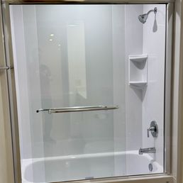 Renovated shower/tub. Basic white.