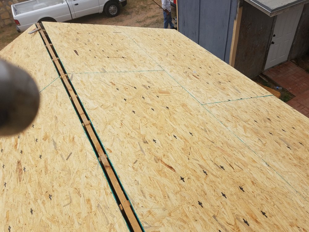 Slide of Rhino Roofing & Construction