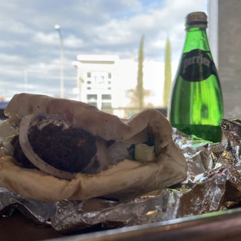 Mr. Shawarma - Falafel Pita with Hummus, cucumber tomato salad, onion sumac and Tahini Sauce. - Middle Eastern Near Me - Norfolk, Virginia