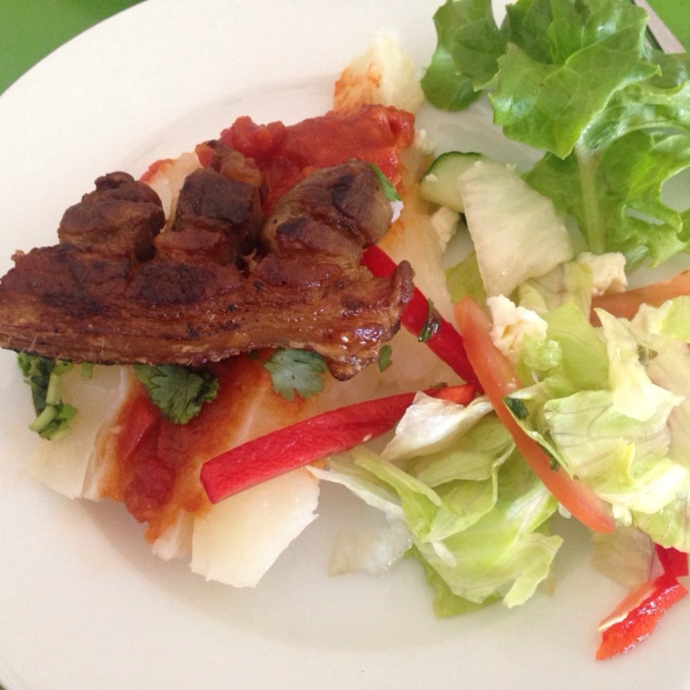 Latino House - Placed some of the chicharron con yuca entree and the salad on a plate as we shared our meals - Specialty Food Near Me - Nailsworth, SA