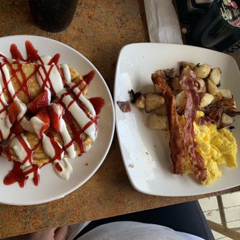 The Brunchery - Strawberry cream cheese filled French toast with a side of hash browns , eggs, and bacon. - Breakfast & Brunch Near Me - Valrico, Florida