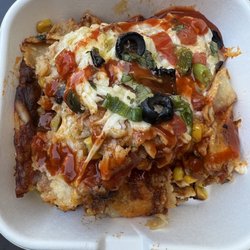 Rainbow Cafe - Cheese enchiladas + Tapatio on top