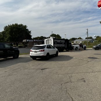 Reliable Truck & Auto - Rescue parking lot party (with the truck waiting to hook up to the camper) - Auto Repair Near Me - Hartford, Wisconsin Reliable Truck & Auto - Rescue parking lot party (with the truck waiting to hook up to the camper) - Auto Repair Near Me - Hartford, Wisconsin