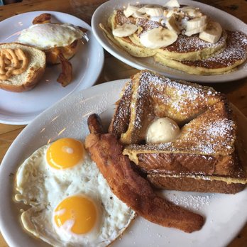 The Pan - Banana pancakes with coconut syrup and brioche breakfast sandwich. The French toast was excellent too! - Pizza Near Me - Gardena, California