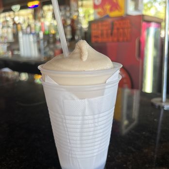 The Red Door Saloon - a drink in a plastic cup - Dive Bars Near Me - Destin, Florida