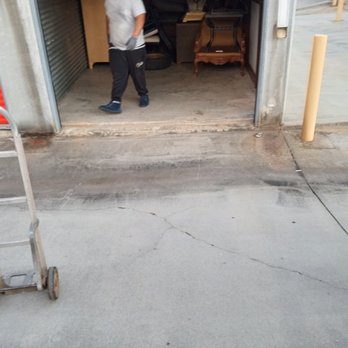 Boss Baby Movers And Services - a man in a garage - Movers Near Me Boss Baby Movers And Services - a man in a garage - Movers Near Me
