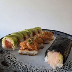 Robert roll ($16), crispy rice w spicy tuna ($14.50), and yellowtail roll ($7)
