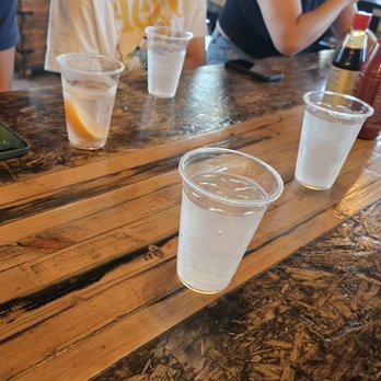 Let's Pho - people sitting at a table with drinks and cell phones - Vietnamese Near Me - Sherman Oaks, California Let's Pho - people sitting at a table with drinks and cell phones - Vietnamese Near Me - Sherman Oaks, California