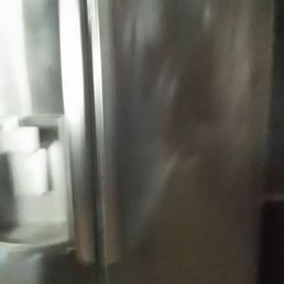 My refrigerator cost over $2000. Employee of Modern Maids did this to it. My refrigerator cost over $2000. Employee of Modern Maids did this to it.