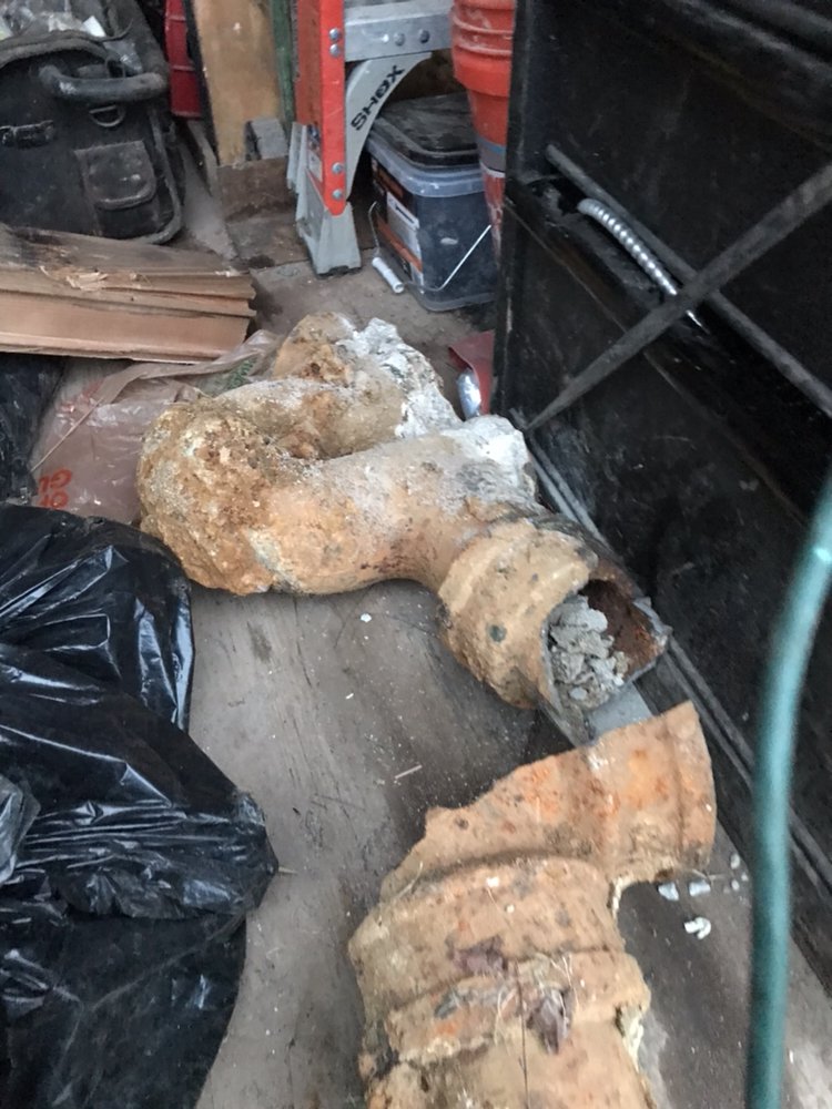 Slide of Lou's Plumbing