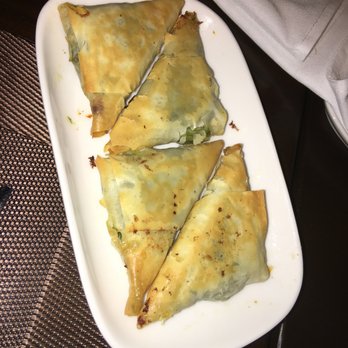 Kyma - Spanakopita spinach and feta cheese triangles, baked in country filo - Greek Near Me - Atlanta, Georgia