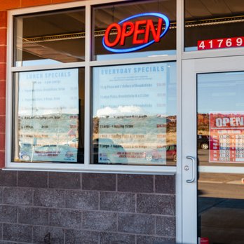Pizza Edge - the open sign in the window - Pizza Near Me - Burnside, Arizona Pizza Edge - the open sign in the window - Pizza Near Me - Burnside, Arizona