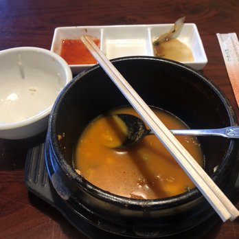 Gangnam Seattle - Soft Tofu Soup (kimchi), white rice, and banchan (kimchi, sprouts, marinated potato?). Also the ceramic bowl looks bigger in person. - Korean Near Me - Seattle, Washington Gangnam Seattle - Soft Tofu Soup (kimchi), white rice, and banchan (kimchi, sprouts, marinated potato?). Also the ceramic bowl looks bigger in person. - Korean Near Me - Seattle, Washington