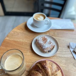 Aero Coffee Roasters - Chocolate and butter croissant and cappuccino