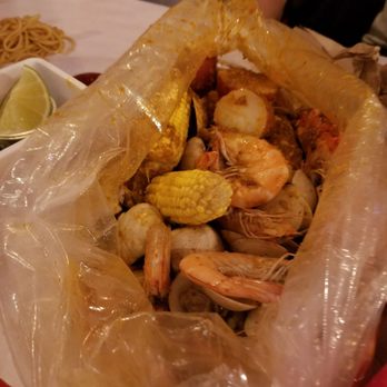 The Crab Pad - A bag of seafood in cajun seasoning - Seafood Near Me - Chicago, Illinois The Crab Pad - A bag of seafood in cajun seasoning - Seafood Near Me - Chicago, Illinois