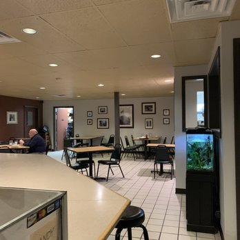 Irvin's On Main - a restaurant with tables and chairs - American Near Me - Bellwood, Pennsylvania Irvin's On Main - a restaurant with tables and chairs - American Near Me - Bellwood, Pennsylvania