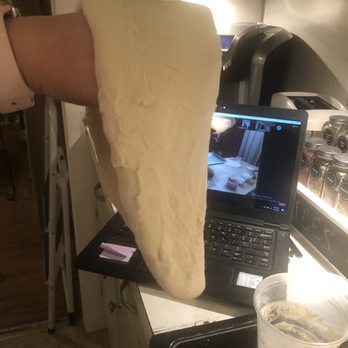 Peels on Wheels - Stretching the dough - Pizza Near Me - Rochester, New York Peels on Wheels - Stretching the dough - Pizza Near Me - Rochester, New York