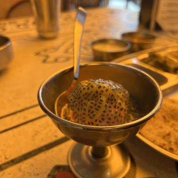Rajdhani - a bowl of food on a table - Indian Near Me - Artesia, California