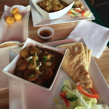 Tropical Nights Restaurant & Lounge - Dalphouri accompanied by shrimp and potato curry, along side phoulori with tamarind sauce. - Caribbean Near Me - Toronto, Ontario