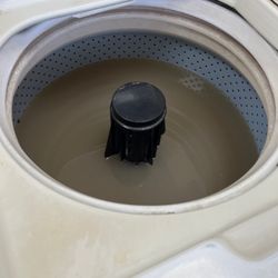 Coronado Laundry - Washing machines left open with brown water.