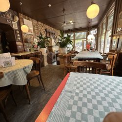 Koffiehuis De Hoek - Interior dining. There's about 10 tables inside and an additional 10 or more outside.