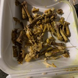 Island Spice Carribean Restaurant - Pile of bones, hacked into tiny, sharp pieces.