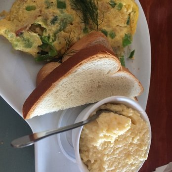 Two Chicks Cafe - Under the Sea Omelet & grits - Breakfast & Brunch Near Me - New Orleans, Louisiana Two Chicks Cafe - Under the Sea Omelet & grits - Breakfast & Brunch Near Me - New Orleans, Louisiana