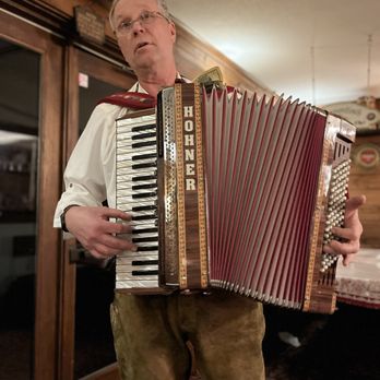 Gasthaus Bavarian Hunter - a man playing an accordion - German Near Me - Stillwater, Minnesota