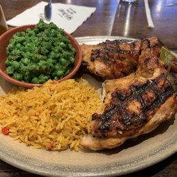 1/2 chicken and Portuguese rice and macho peas 1/2 chicken and Portuguese rice and macho peas