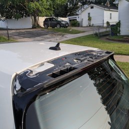 Missing spoiler panel - This is a plastic-welded assembly that shouldn't have been removed in the manner performed. Lost it on the highway.